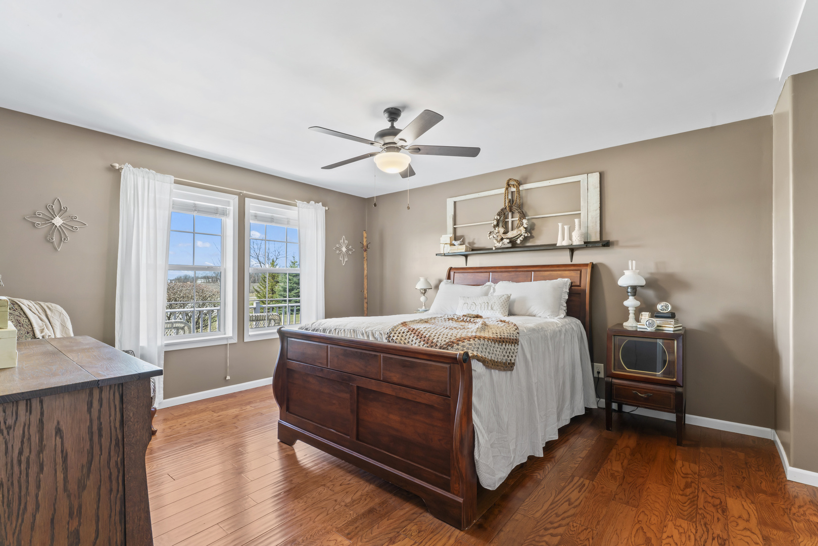 3015 North 1600 East Road Clifton, IL 60927 - Photo 19 of 46 a bed sitting in a spacious bedroom next to a window