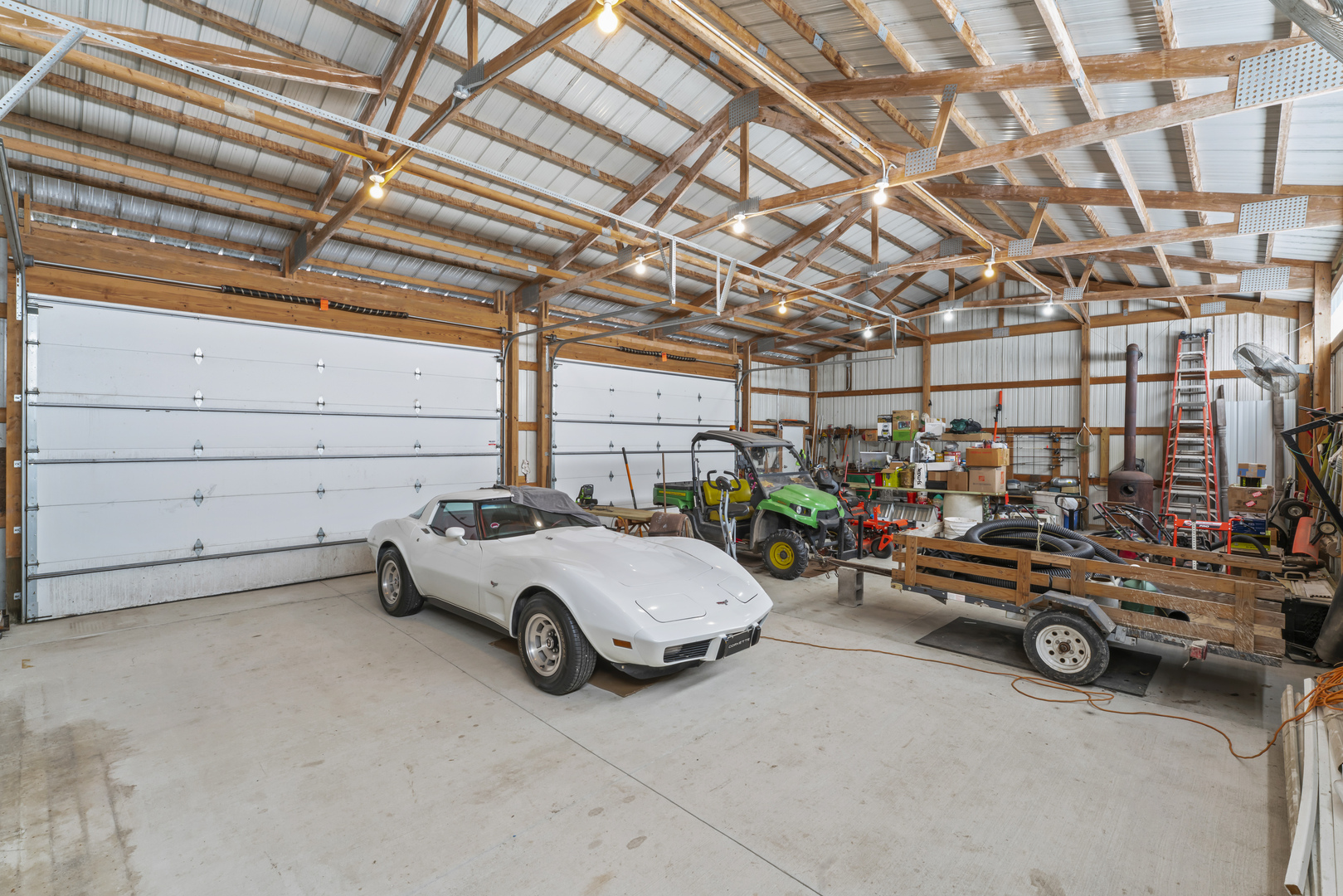 3015 North 1600 East Road Clifton, IL 60927 - Photo 43 of 46 a view of parking garage with cars parked
