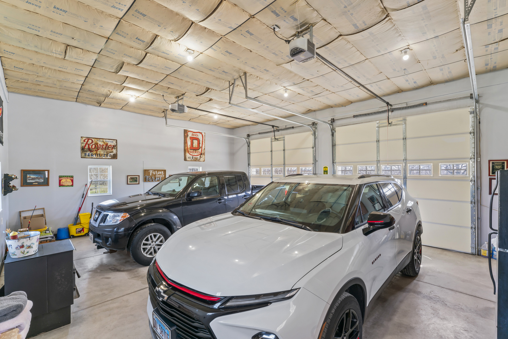 3015 North 1600 East Road Clifton, IL 60927 - Photo 45 of 46 a car is parked in a garage