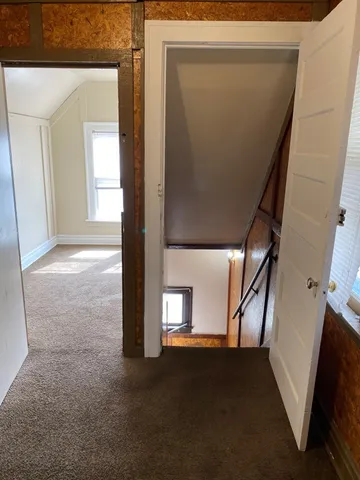 a view of an entryway with a floor