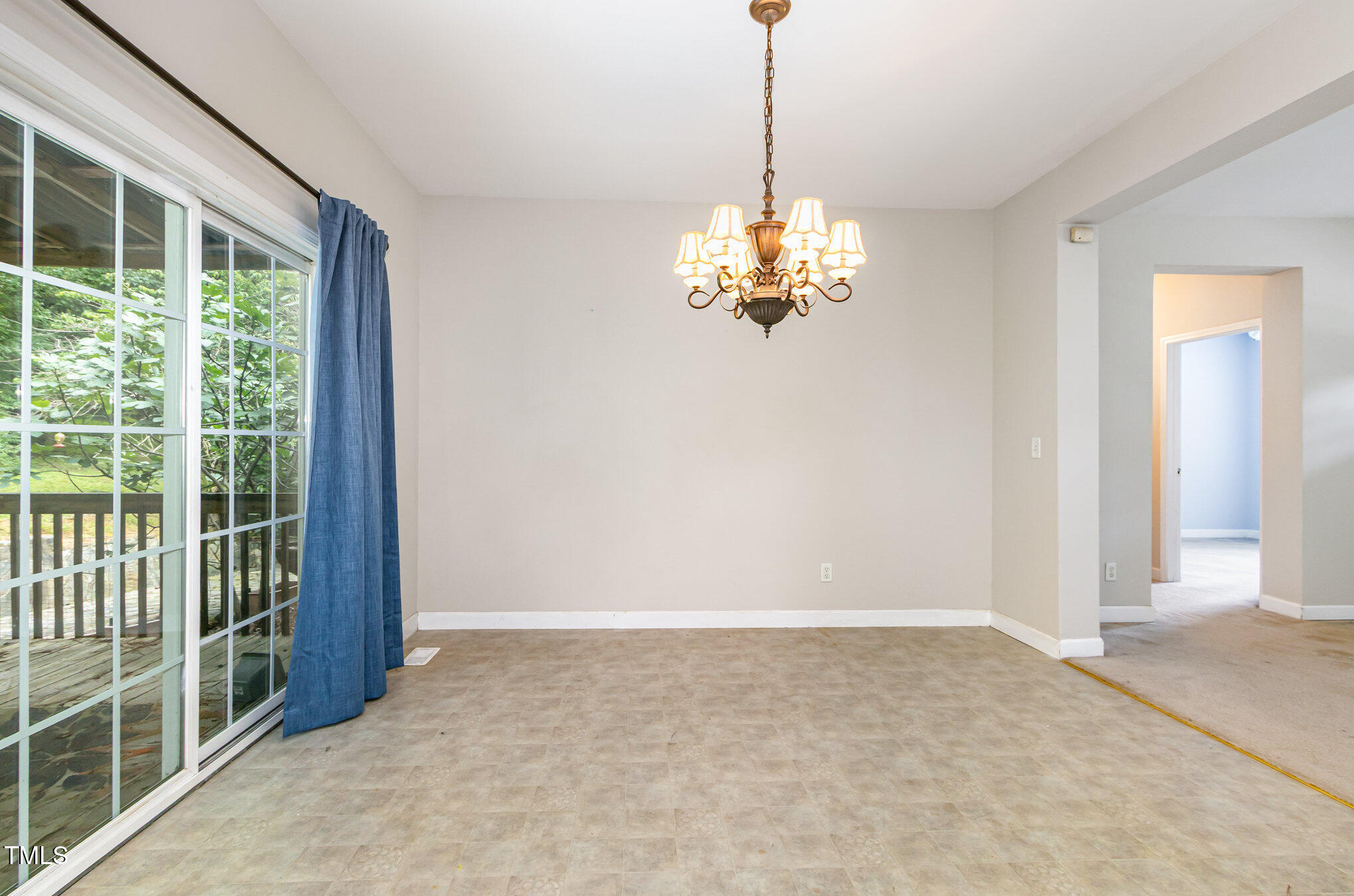 824 Kittrell Road Kittrell, NC 27544 - Photo 13 of 37 a view of a livingroom with a chandelier stove and stairs