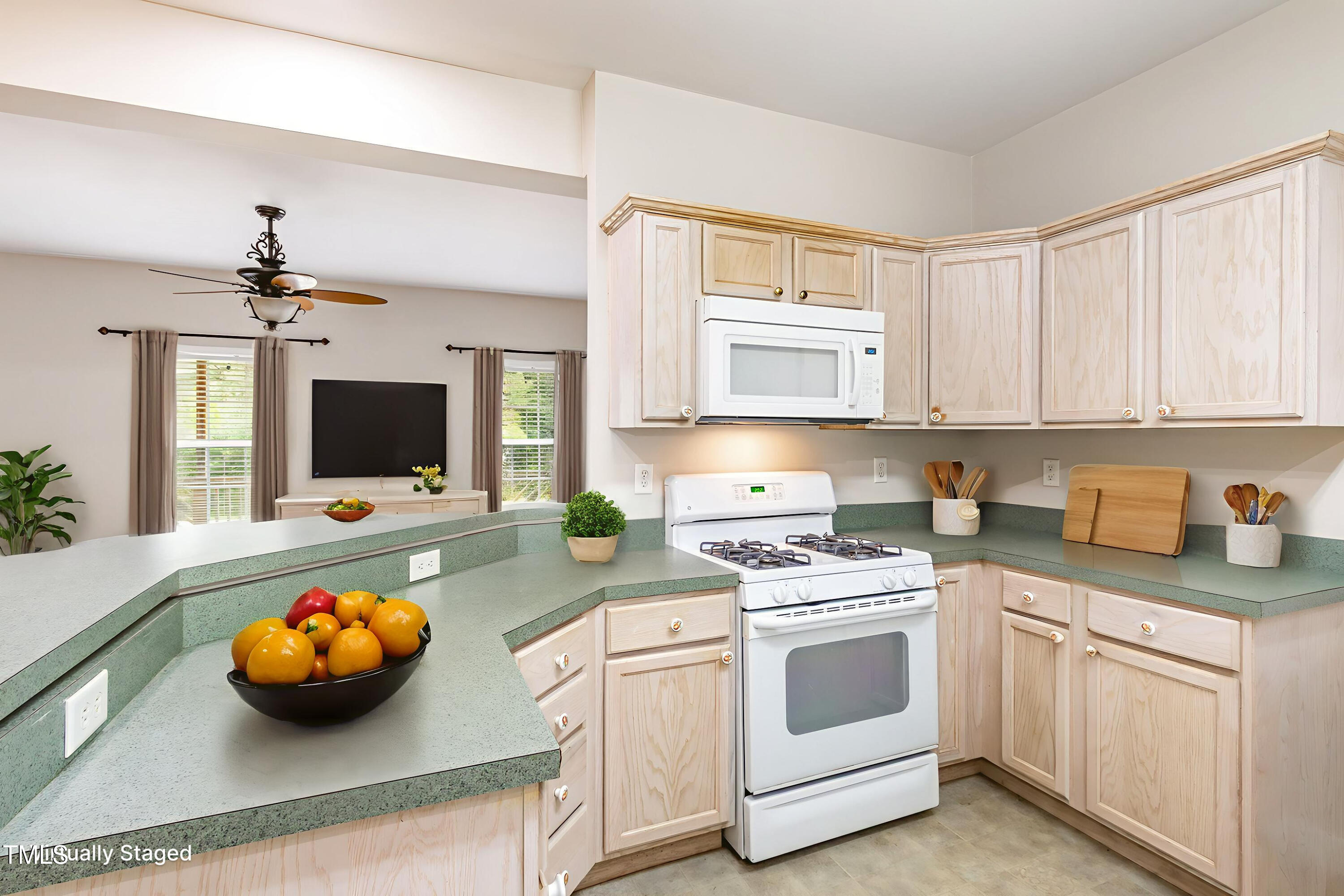 824 Kittrell Road Kittrell, NC 27544 - Photo 17 of 37 a kitchen with cabinets and stainless steel appliances