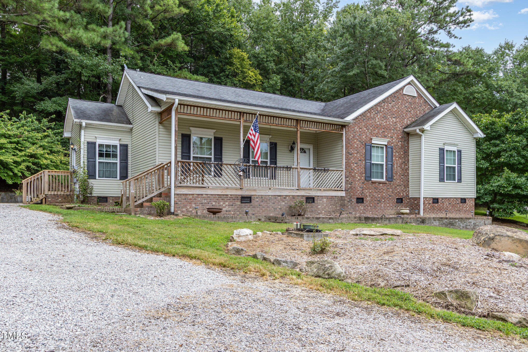 824 Kittrell Road Kittrell, NC 27544 - Photo 3 of 37 a front view of a house with a yard and porch