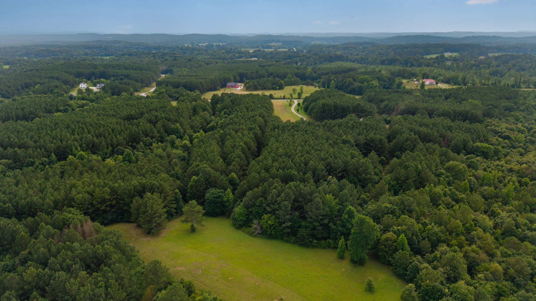 6701 Spring Place Road Southeast Old Fort, TN 37362 - Photo 11 of 11 an aerial view of residential houses with outdoor space and trees