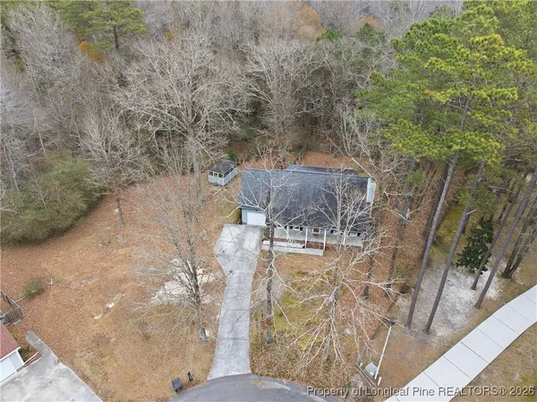 a house with trees in front of it