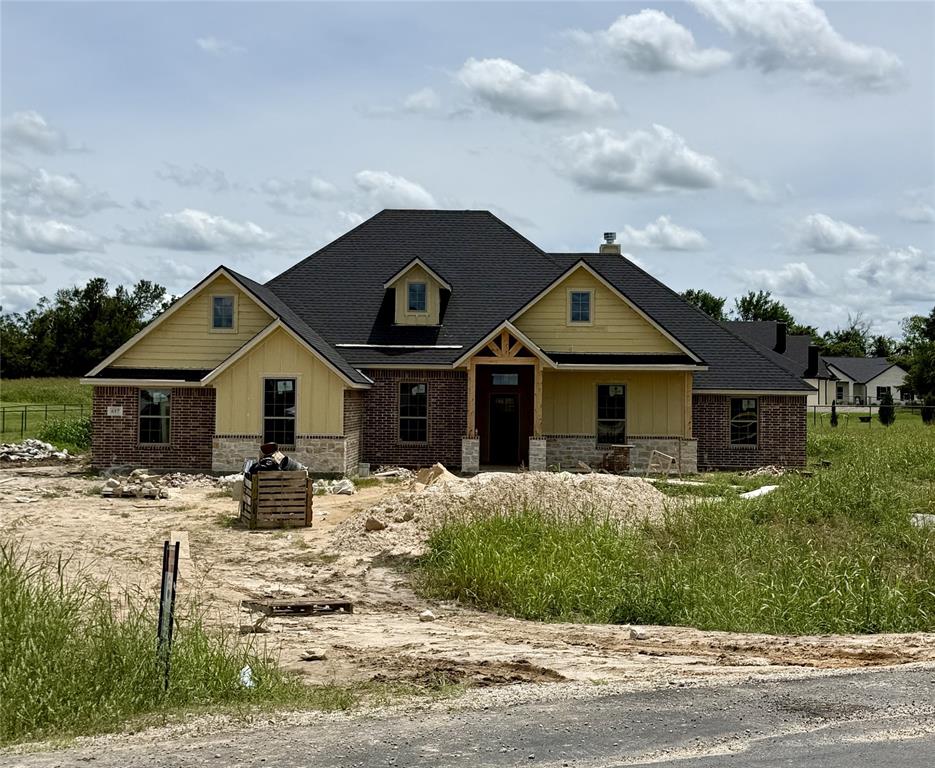 612 Winkler Way Springtown, TX 76082 - Photo 1 of 1 a front view of a house with a yard