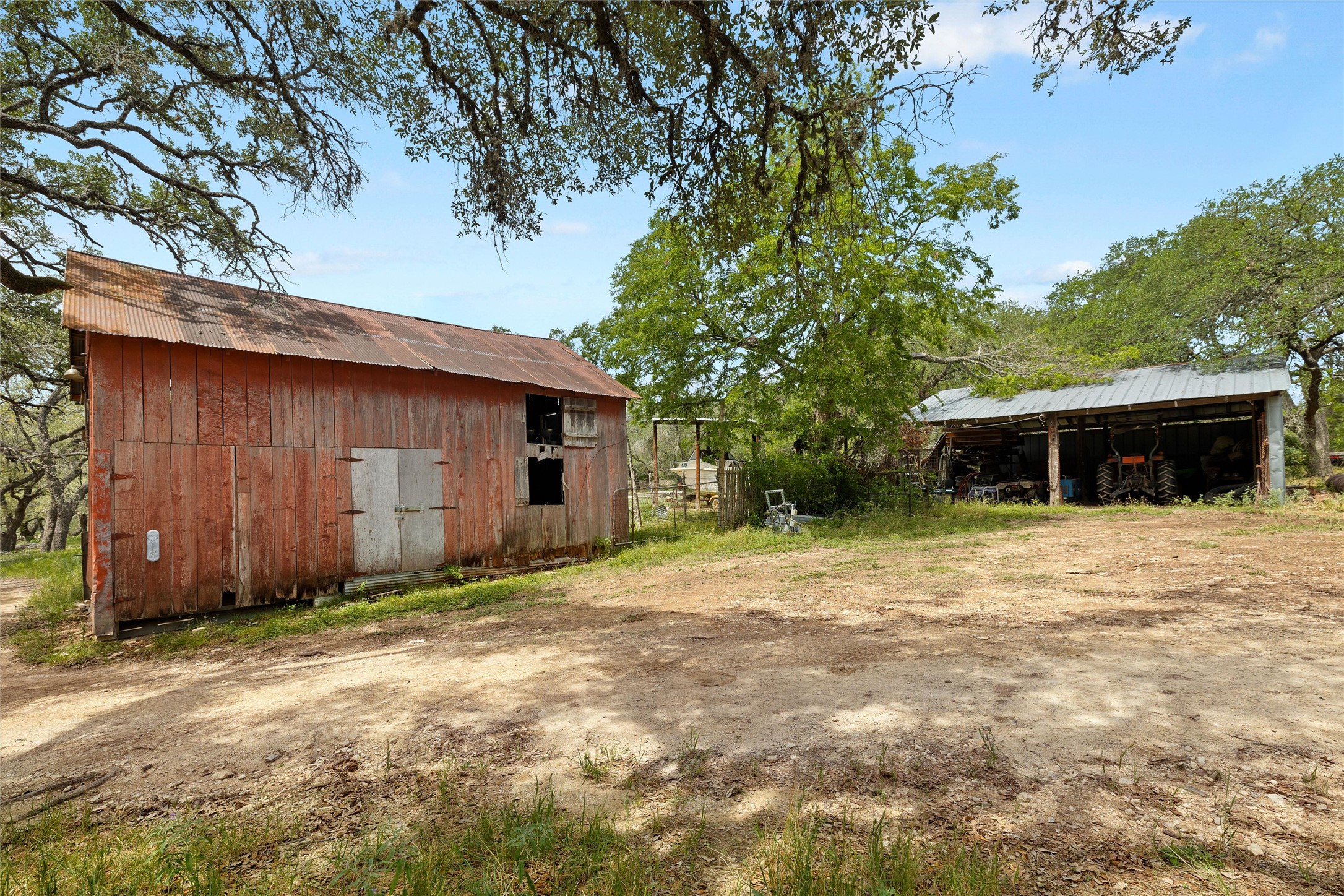 1128 Posey Ranch Road Fischer, TX 78623 - Photo 24 of 39 a front view of a house with a yard