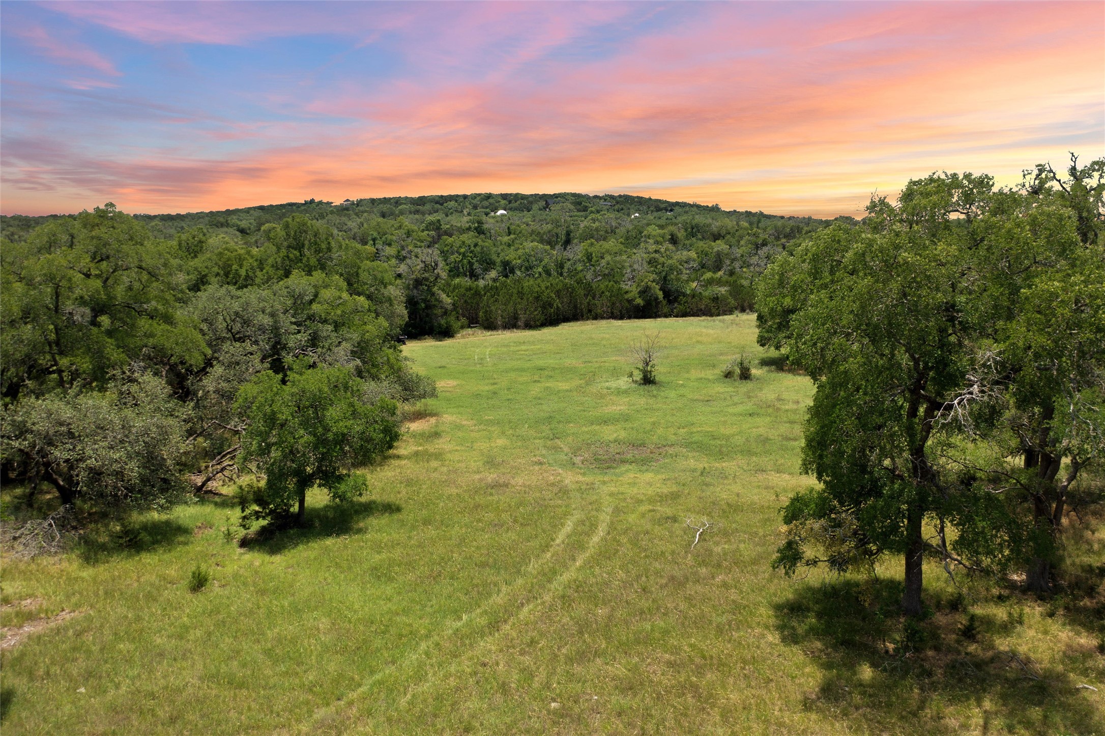1128 Posey Ranch Road Fischer, TX 78623 - Photo 10 of 39 a view of a field with an ocean