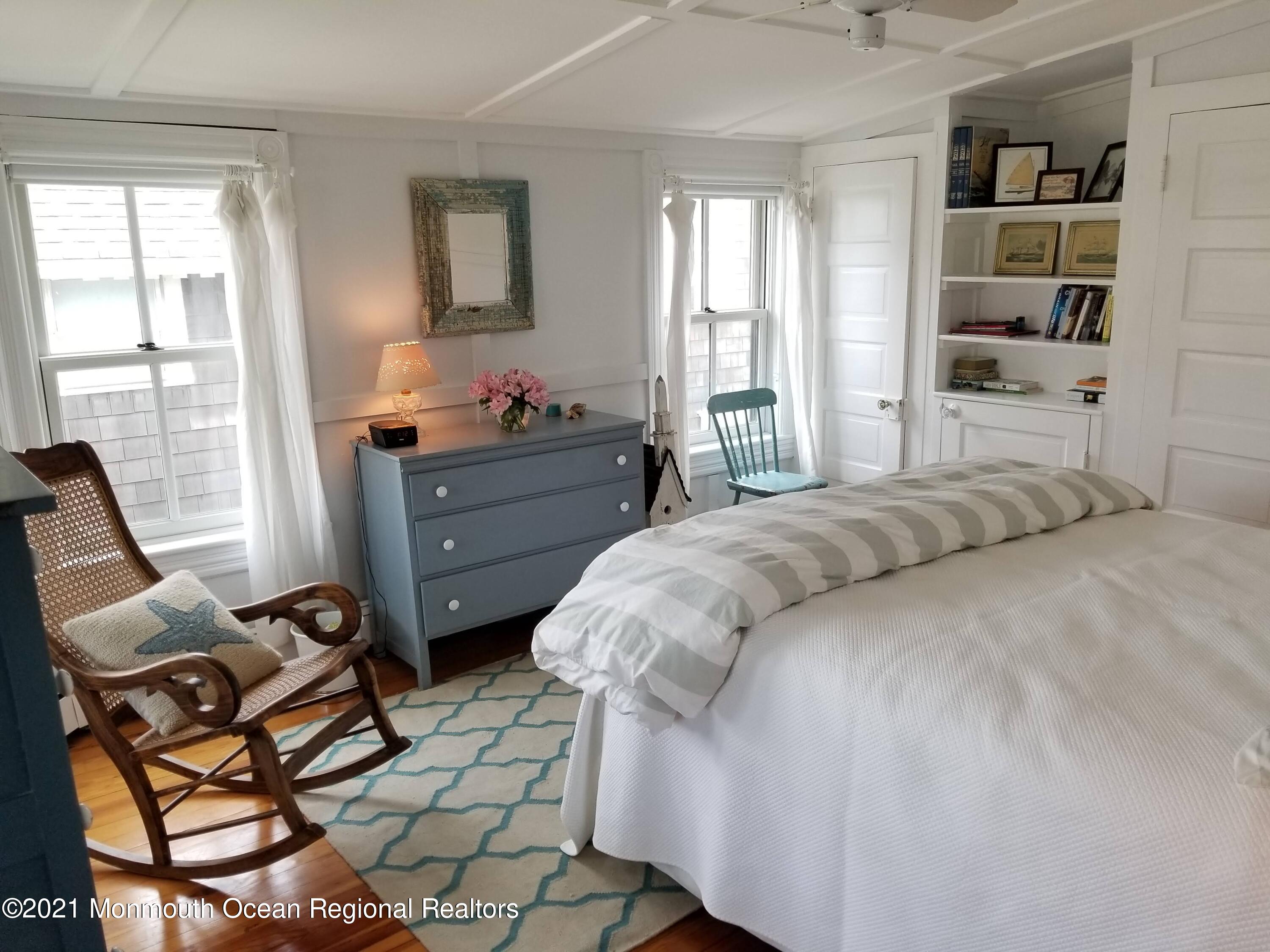 6 Heck Avenue Ocean Grove, NJ 07756 - Photo 14 of 14 a bedroom with a bed and a window