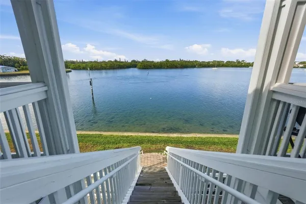 a view of swimming pool from a balcony