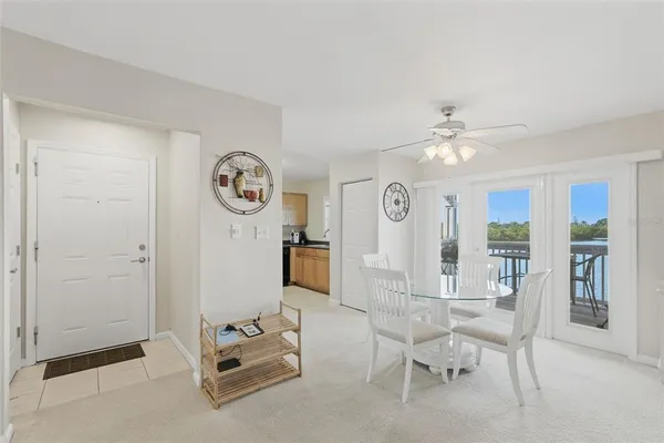 a view of a livingroom with furniture and a chandelier