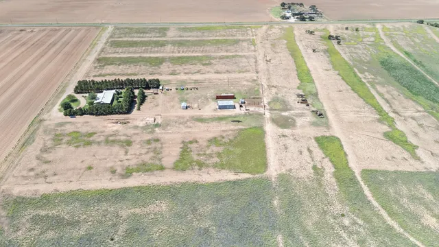 a view of a yard with an outdoor space