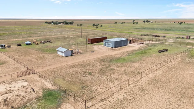 a bathroom with a shower curtain and a window