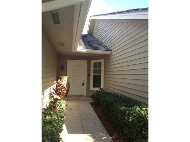 114 Colony Way East Jupiter, FL 33458 - Photo 2 of 7 a front view of a house