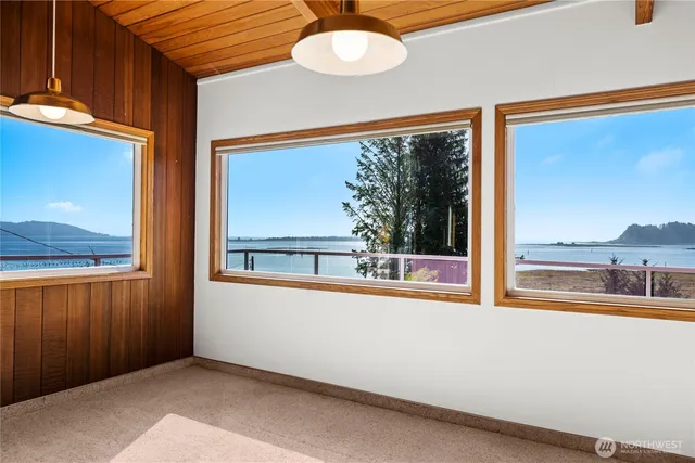 a view of a room with a large window