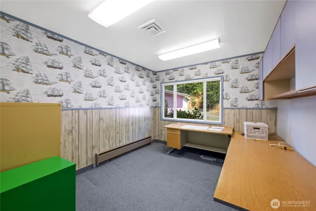 a bathroom with a bathtub and a window
