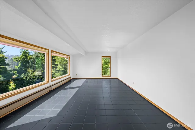 a view of hallway with a large window