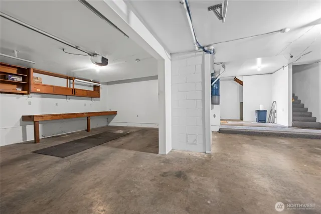 a view of a hallway with stairs