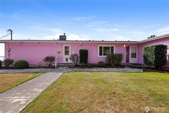 a view of swimming pool with outdoor seating
