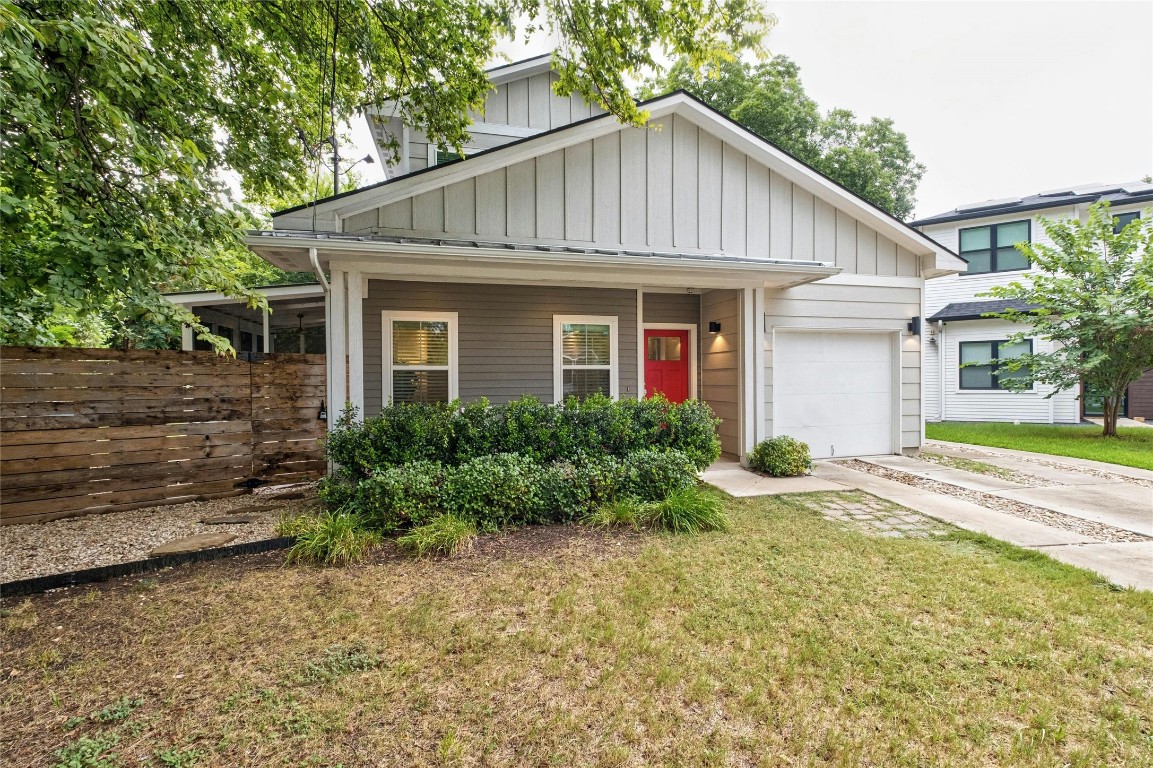 1022 Linden Street, Unit A Austin, TX 78702 - Photo 1 of 1 a view of a house with a yard plants and large tree