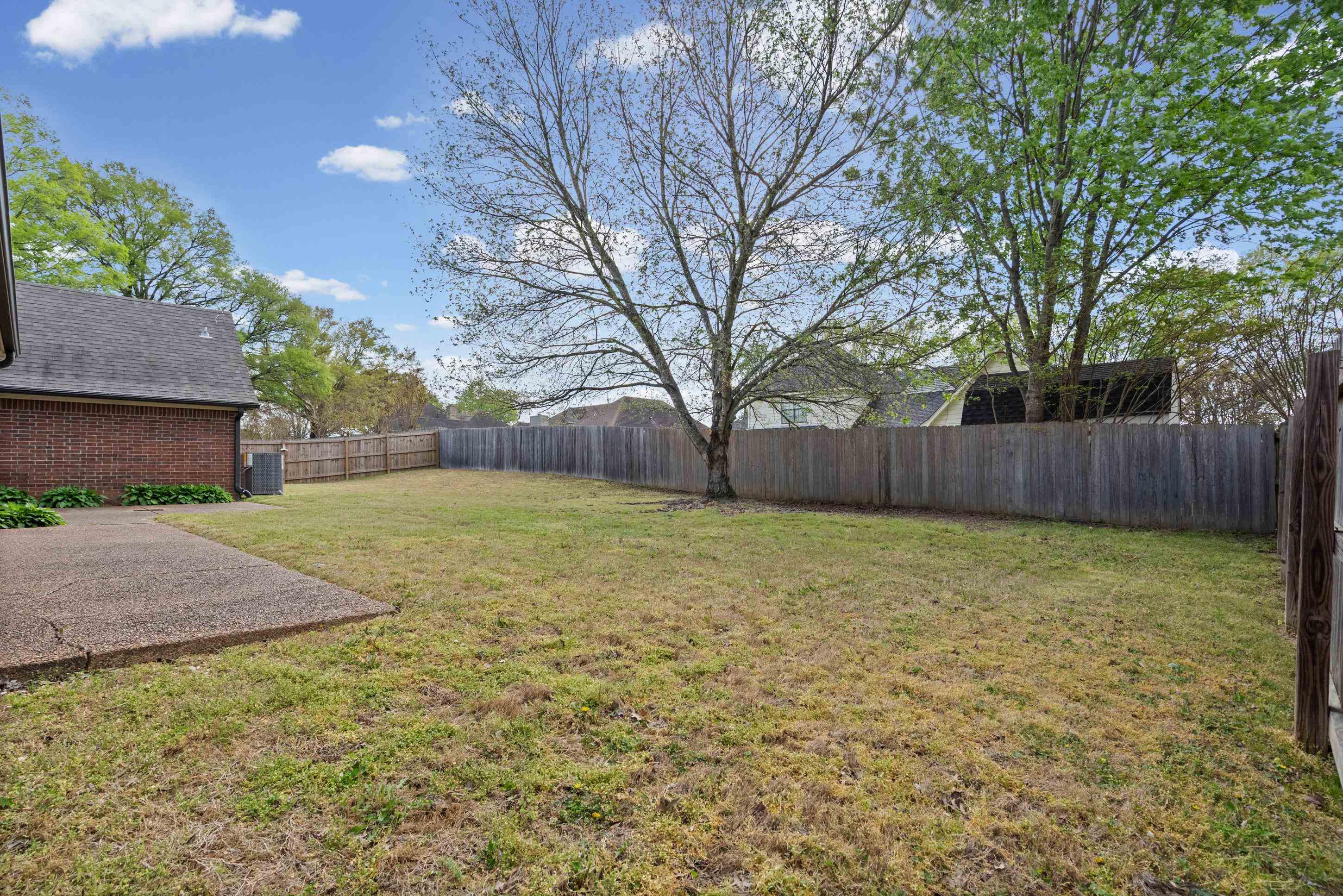 1301 Wolf Lair Drive Collierville, TN 38017 - Photo 27 of 32 View of fenced backyard