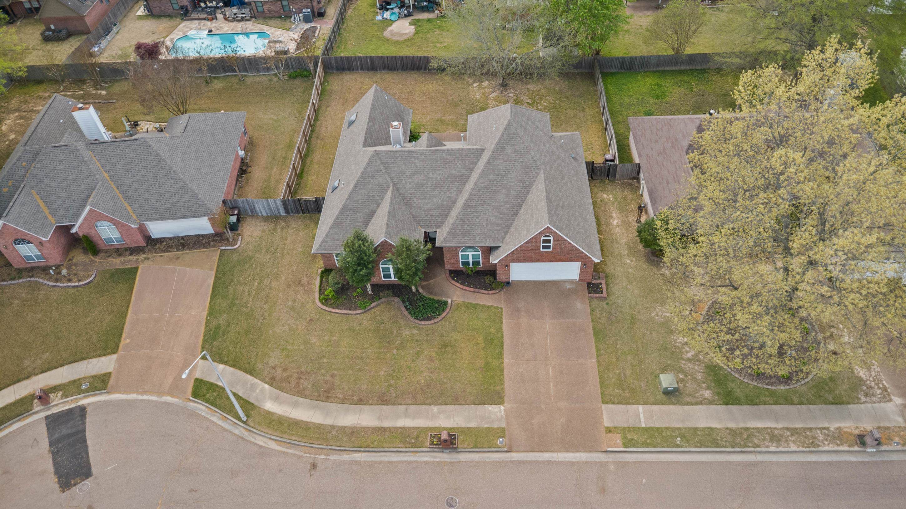 1301 Wolf Lair Drive Collierville, TN 38017 - Photo 29 of 32 View from above of property with a pool
