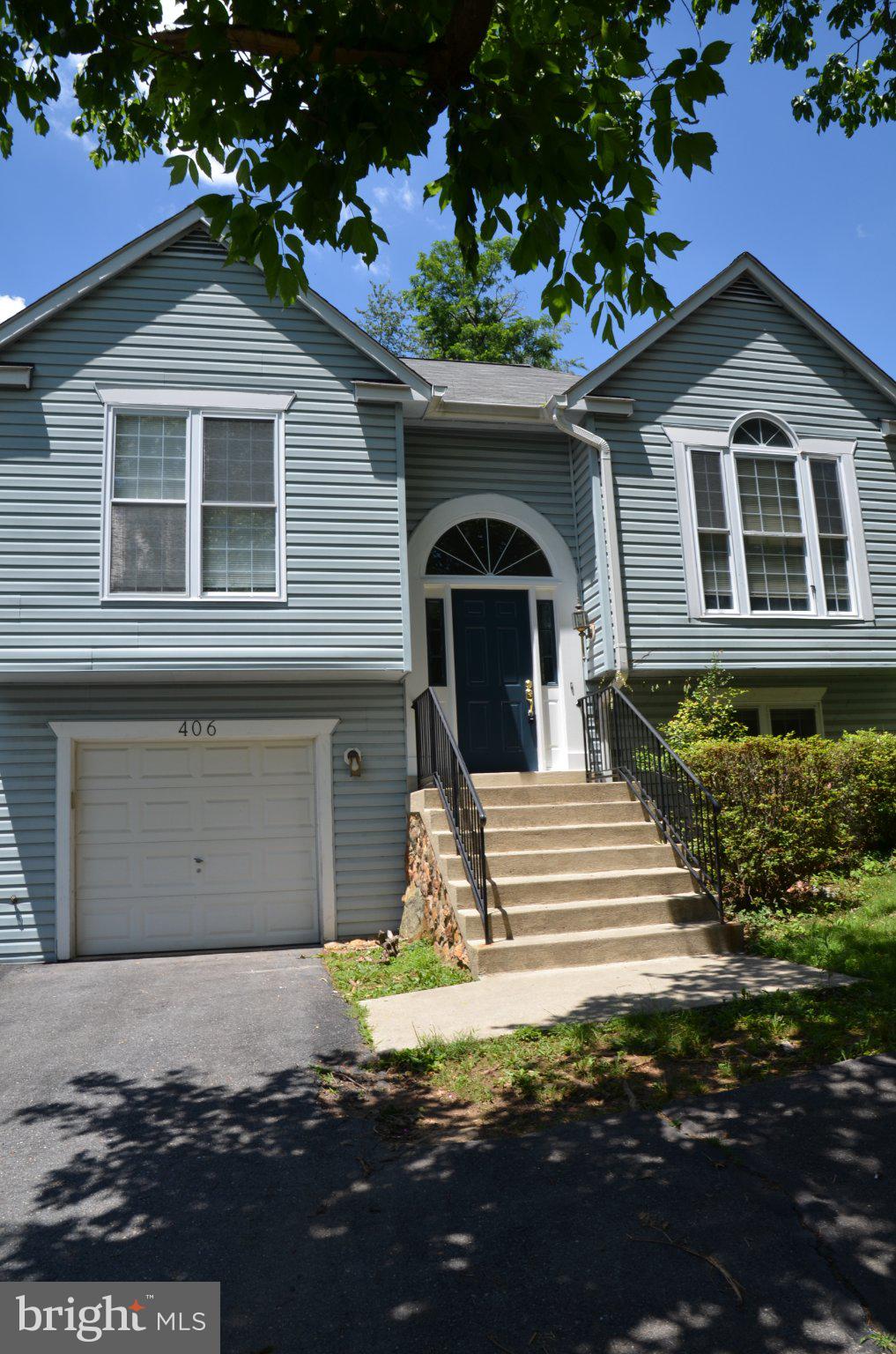 406 Longdraft Road Gaithersburg, MD 20878 - Photo 2 of 24 Charming blue home with inviting steps.