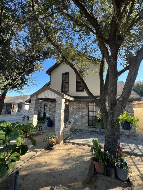 2824 Hawk Street Roma, TX 78584 - Photo 2 of 16 a front view of a house with garden