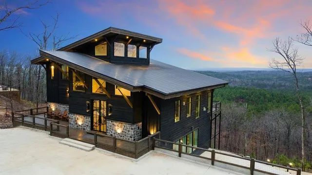 a front view of a house with parking space