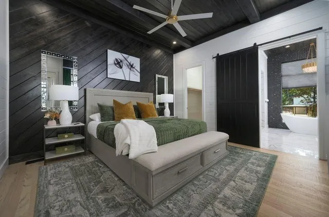 a living room with furniture and a rug