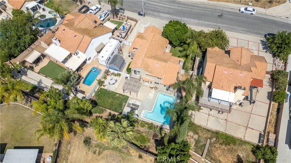 19465 Kinnow Lane Riverside, CA 92508 - Photo 52 of 61 an aerial view of a house with a yard and garden