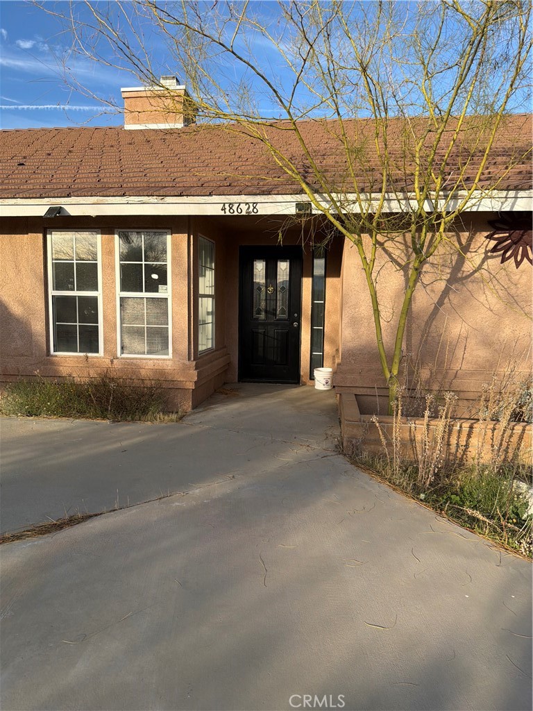 48628 Adeline Way Morongo Valley, CA 92256 - Photo 2 of 26 a view of a building with a outdoor space
