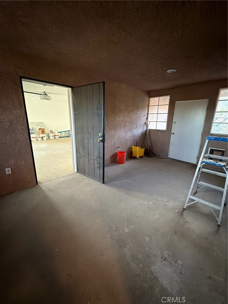 48628 Adeline Way Morongo Valley, CA 92256 - Photo 23 of 26 a view of a room with gym equipment