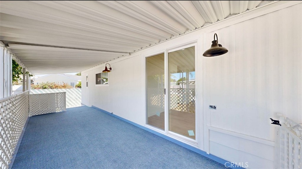 55 Walnut Via Anaheim, CA 92801 - Photo 15 of 25 a view of a hallway with closet and chandelier