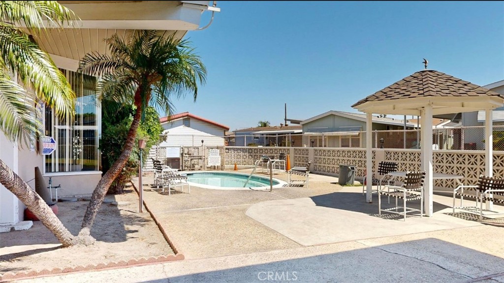 55 Walnut Via Anaheim, CA 92801 - Photo 18 of 25 swimming pool view with a seating space