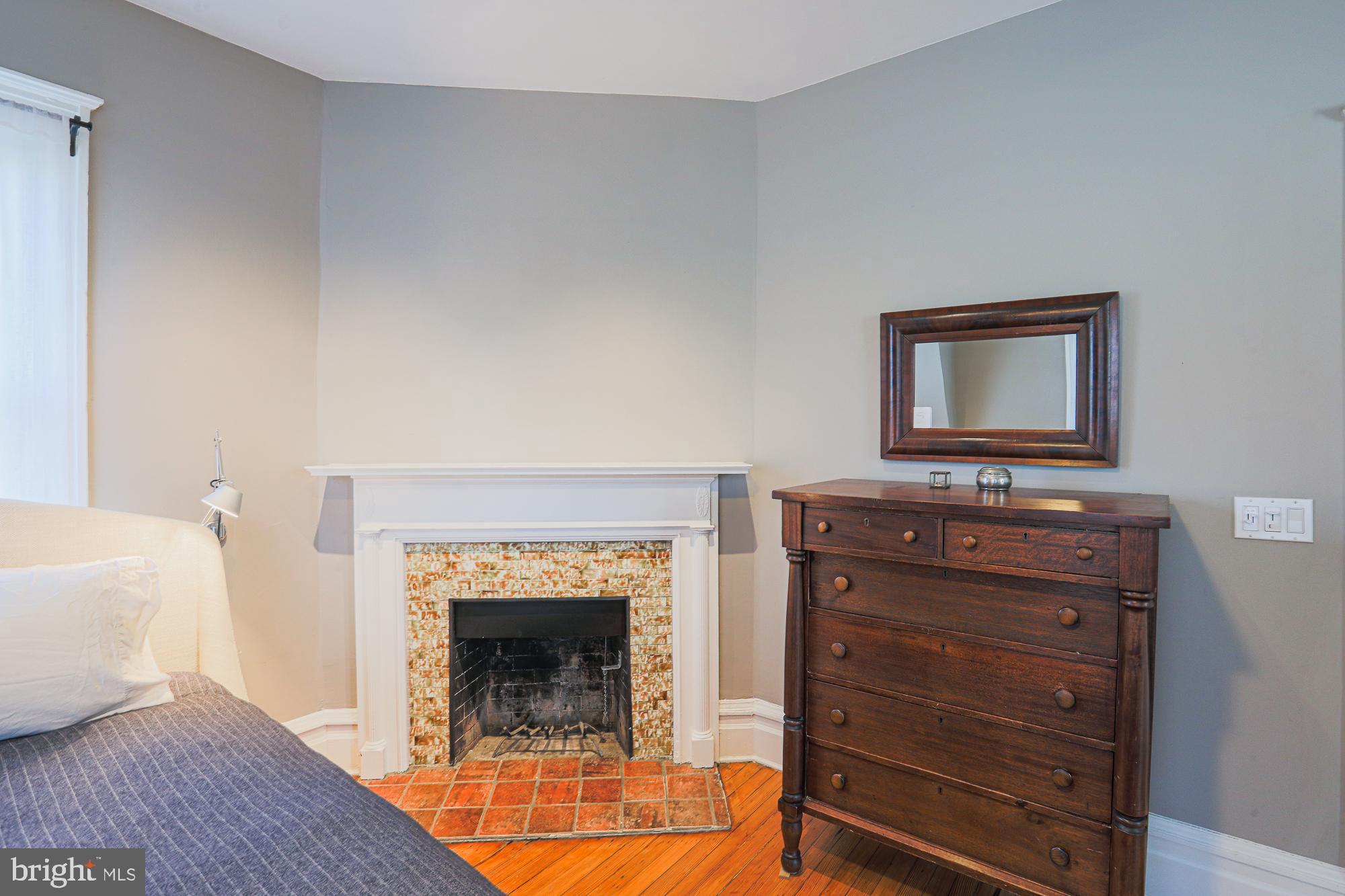 101 Woodlawn Road Baltimore, MD 21210 - Photo 47 of 92 Primary Bedroom fireplace