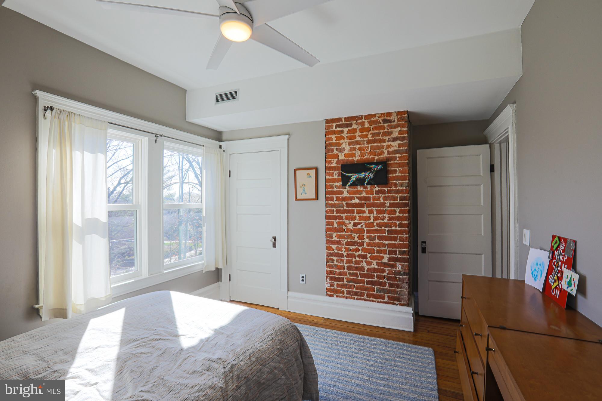 101 Woodlawn Road Baltimore, MD 21210 - Photo 55 of 92 Second bedroom with exposed brick