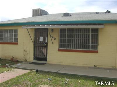 540 East Grant Road Tucson, AZ 85705 - Photo 1 of 5 a front view of a house