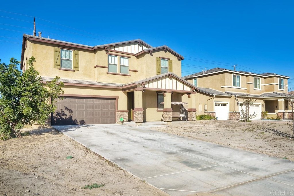30703 View Ridge Lane Menifee, CA 92584 - Photo 1 of 1 a front view of a house with a yard