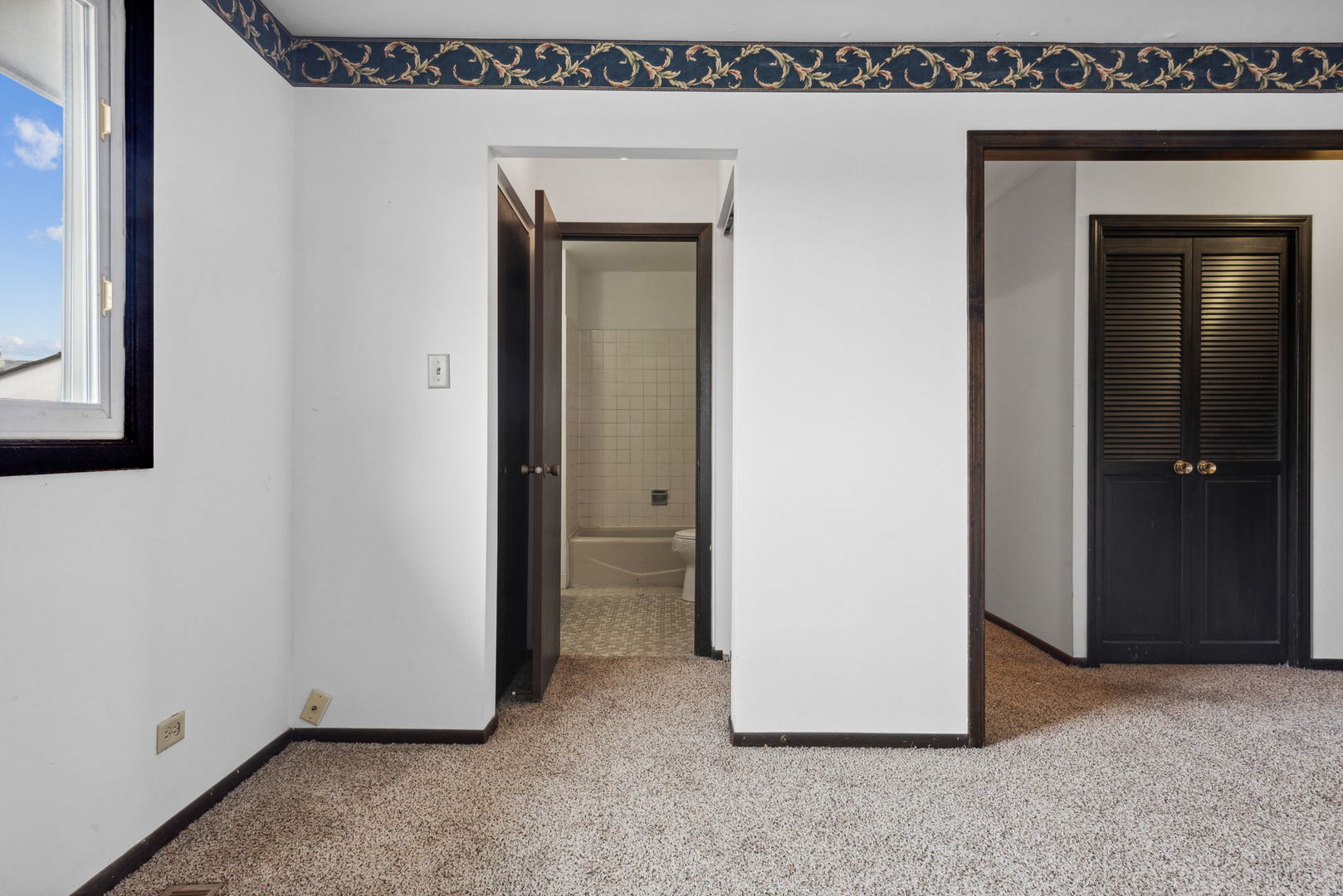 889 Heatherbrook Court Wheaton, IL 60189 - Photo 13 of 24 a view of a room that has a window in it