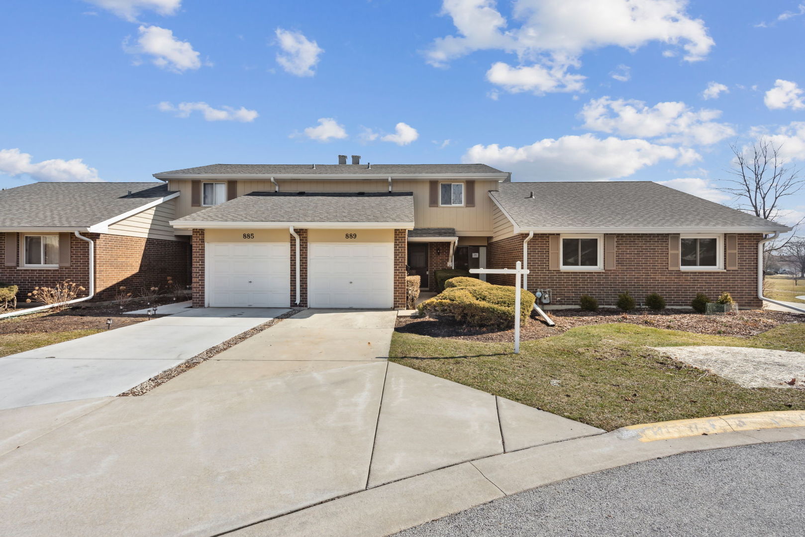 889 Heatherbrook Court Wheaton, IL 60189 - Photo 23 of 24 a front view of a house with garden