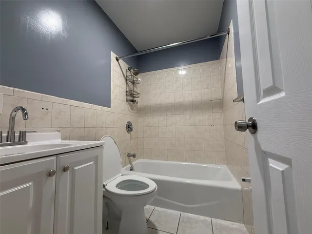a bathroom with a toilet and a sink