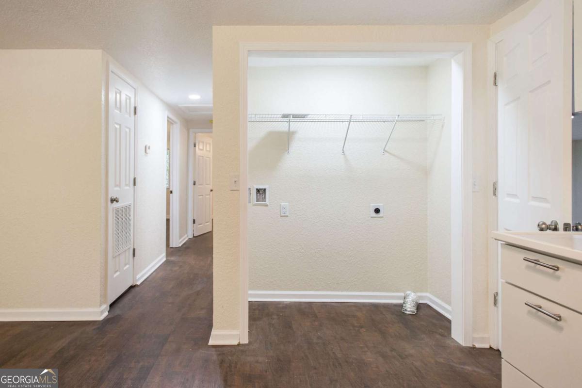 1410 Hazel Street Waycross, GA 31501 - Photo 9 of 21 a view of a bathroom with wooden floor