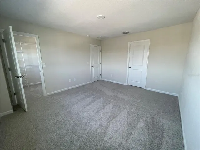 a bathroom with a shower and a toilet