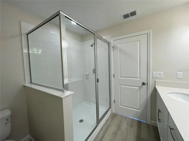 a view of a room with racks on the wall