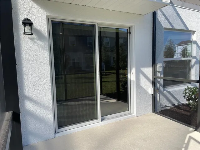 a view of a house with swimming pool