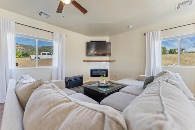 a bedroom with a bed and a fireplace