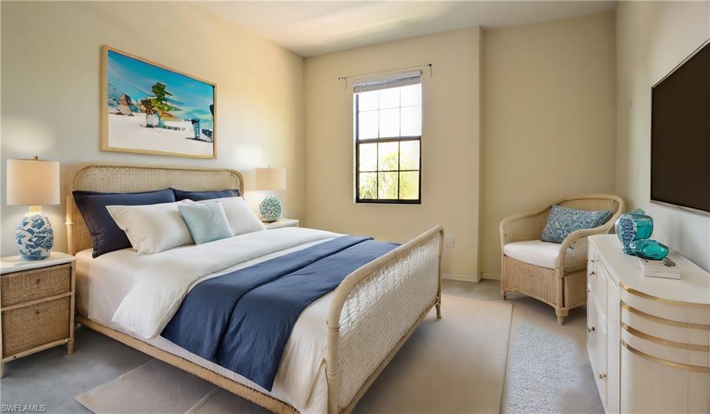 9067 Capistrano Street North, Unit 4503 Naples, FL 34113 - Photo 18 of 41 a bedroom with a bed couch and a window