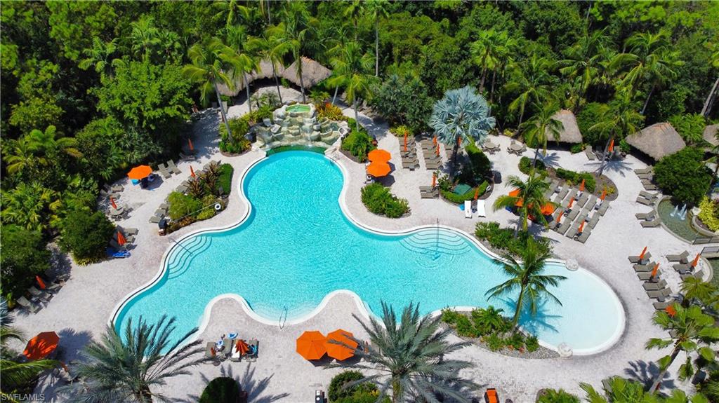 9067 Capistrano Street North, Unit 4503 Naples, FL 34113 - Photo 30 of 41 an aerial view of a swimming pool patio and outdoor seating