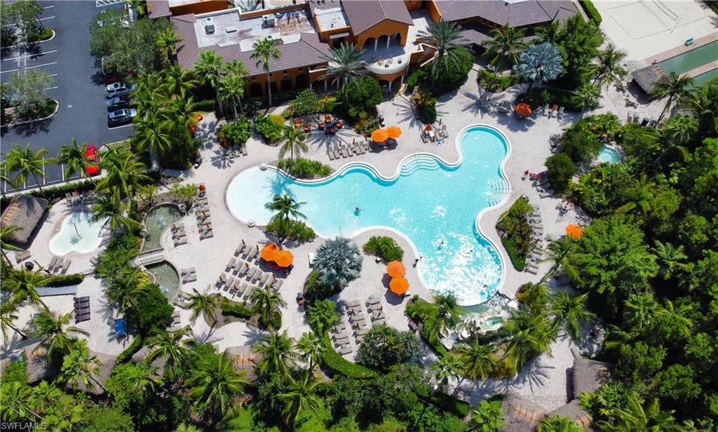 9067 Capistrano Street North, Unit 4503 Naples, FL 34113 - Photo 31 of 41 an aerial view of swimming pool patio and outdoor seating